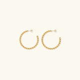 Boucles d'oreilles Gigi Twist en or