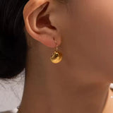 Boucles d'oreilles coquillage dorées Breeze