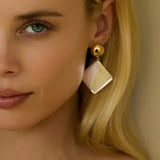 Boucles d'oreilles pendantes géométriques Kelly