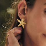 Boucles d'oreilles étoile de mer en or serein