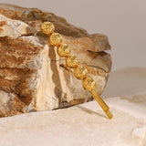 Broche française dorée en perles de corail