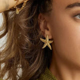 Boucles d'oreilles étoile de mer en or serein